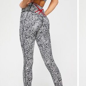 Fabletics Boost PowerHold® High-Waisted Legging Mixed Leopard/Heated Red Medium